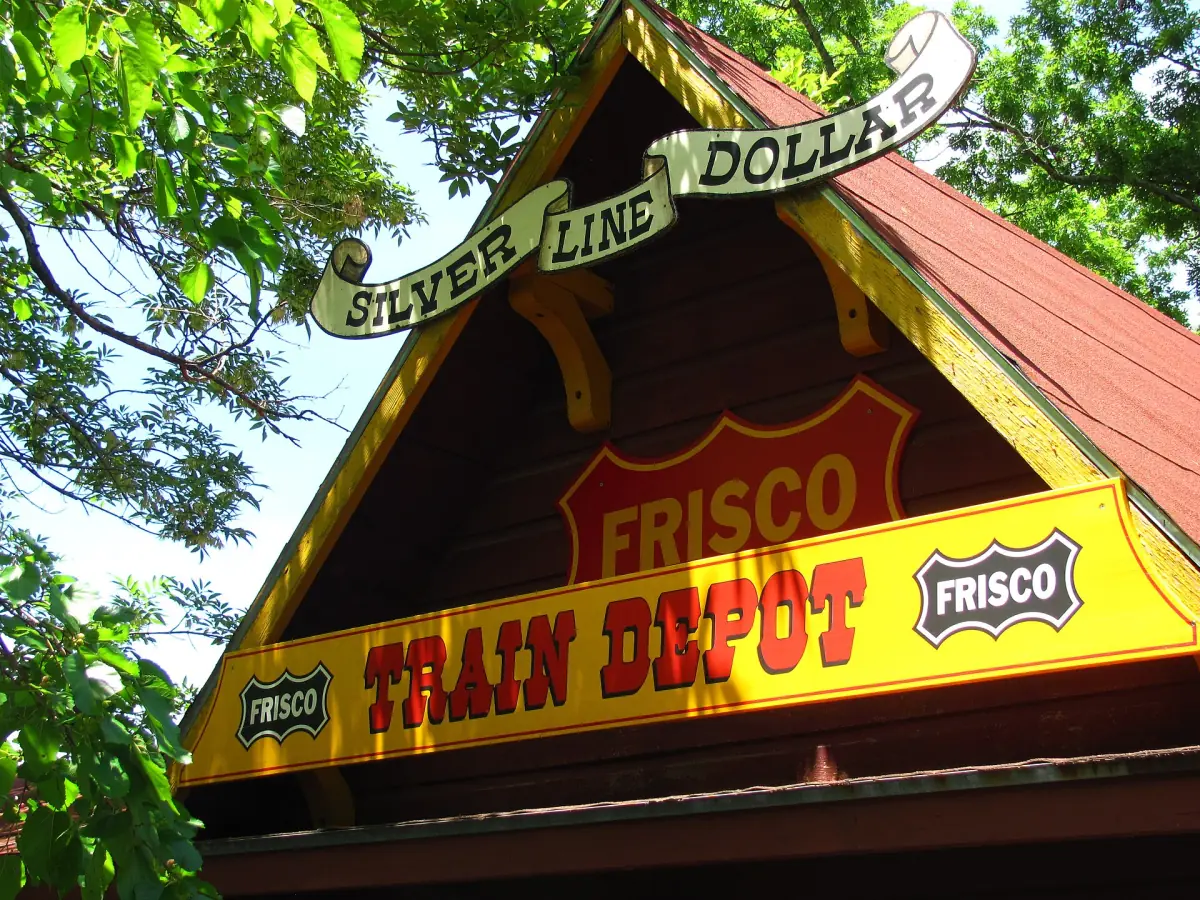 Yellow and red Frisco train depot sign at Silver Dollar City near Branson